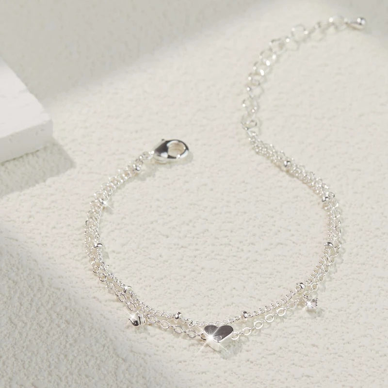 Subtle Sparkle In Every Step. Effortless Elegance For Sun-Kissed Days.